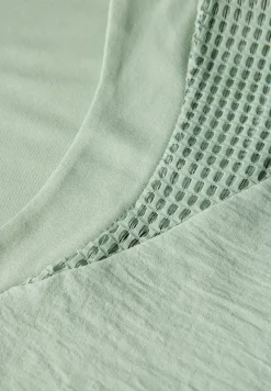 Top met mesh details