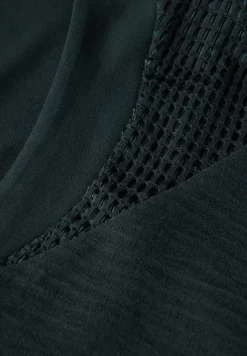 Top met mesh details