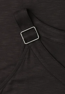 Top met V-hals en decoratief detail