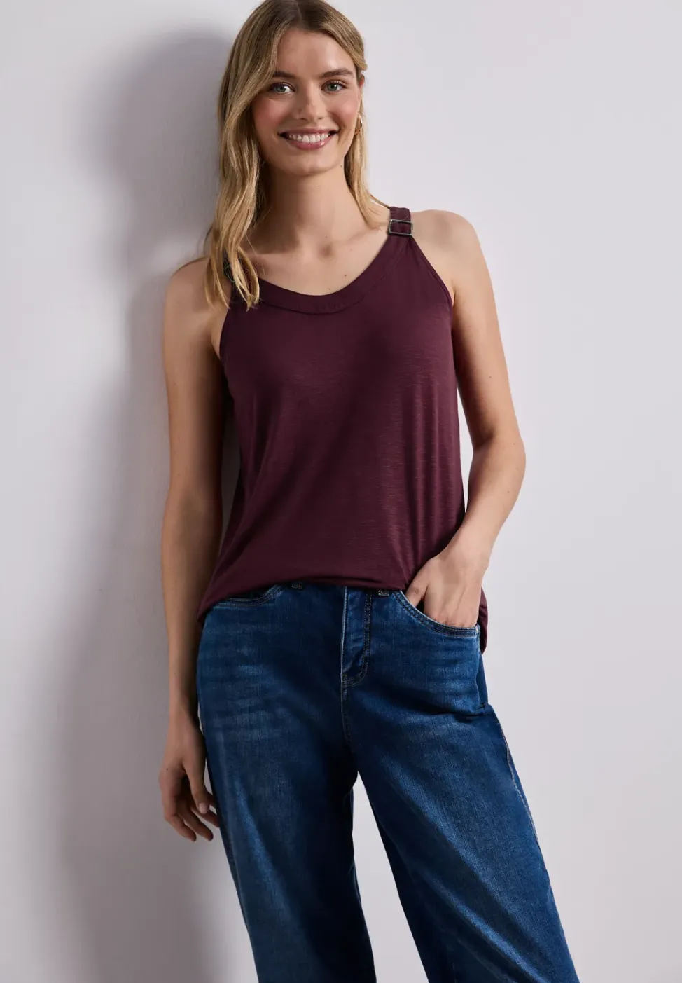 Top met V-hals en decoratief detail
