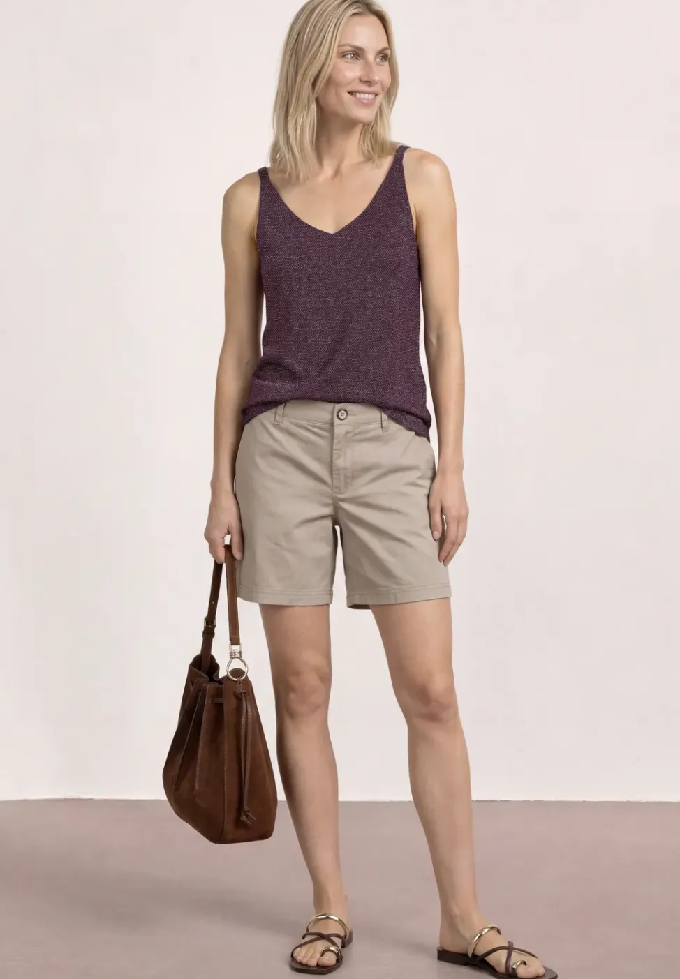Top met V-hals en glitterdetails