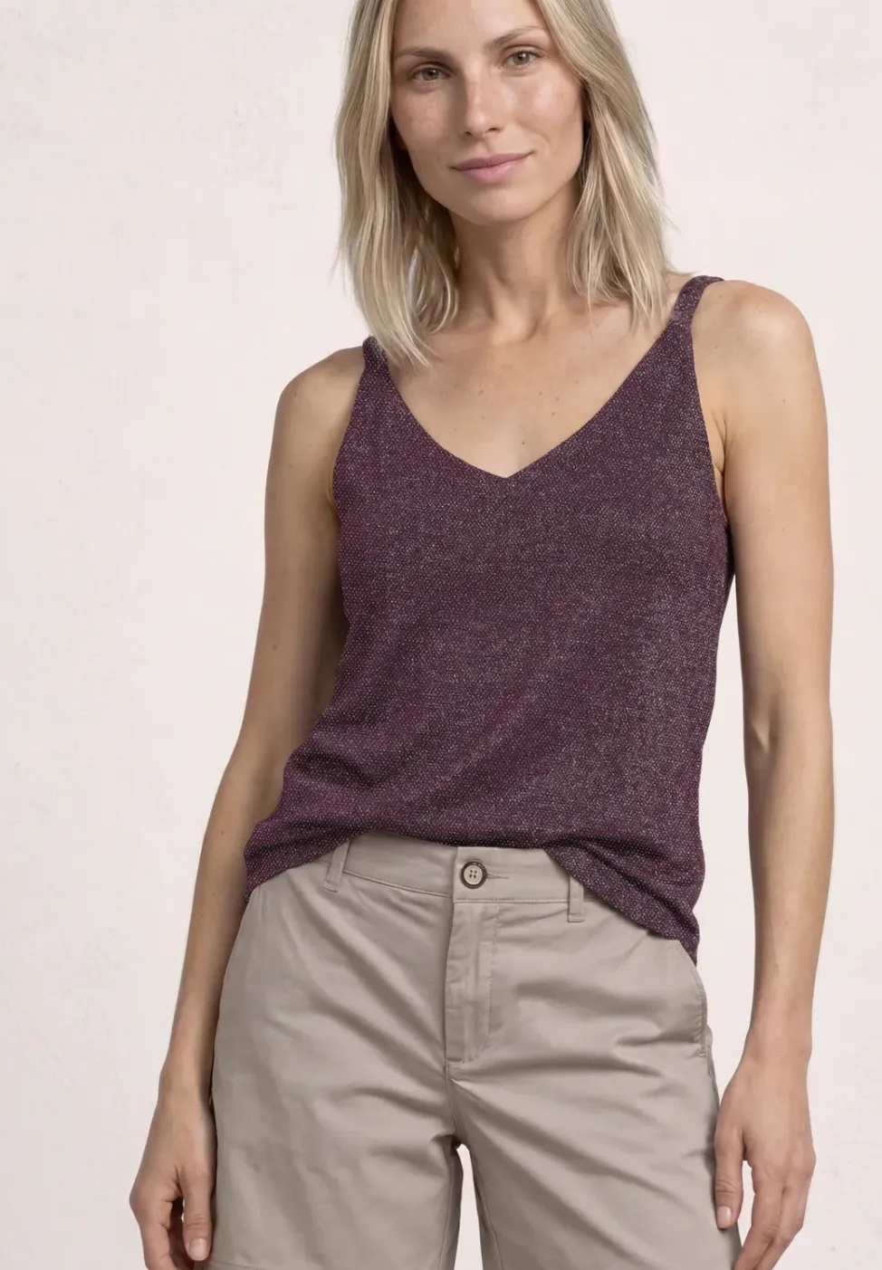 Top met V-hals en glitterdetails