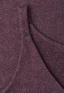 Top met V-hals en glitterdetails