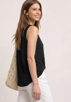 Top met V-hals en knoopdetail