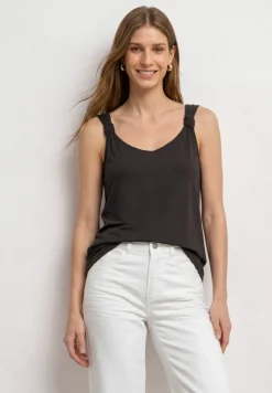 Top met V-hals en knoopdetail