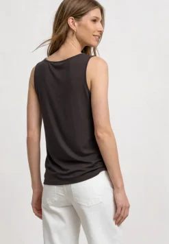 Top met V-hals en knoopdetail