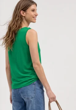Top met V-hals en knoopdetail