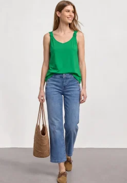 Top met V-hals en knoopdetail