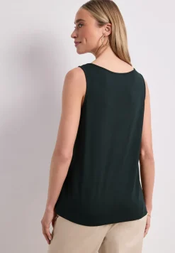 Top met V-hals en knoopdetail