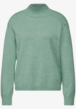 Trui met knoopdetail