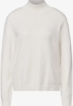 Trui met knoopdetail