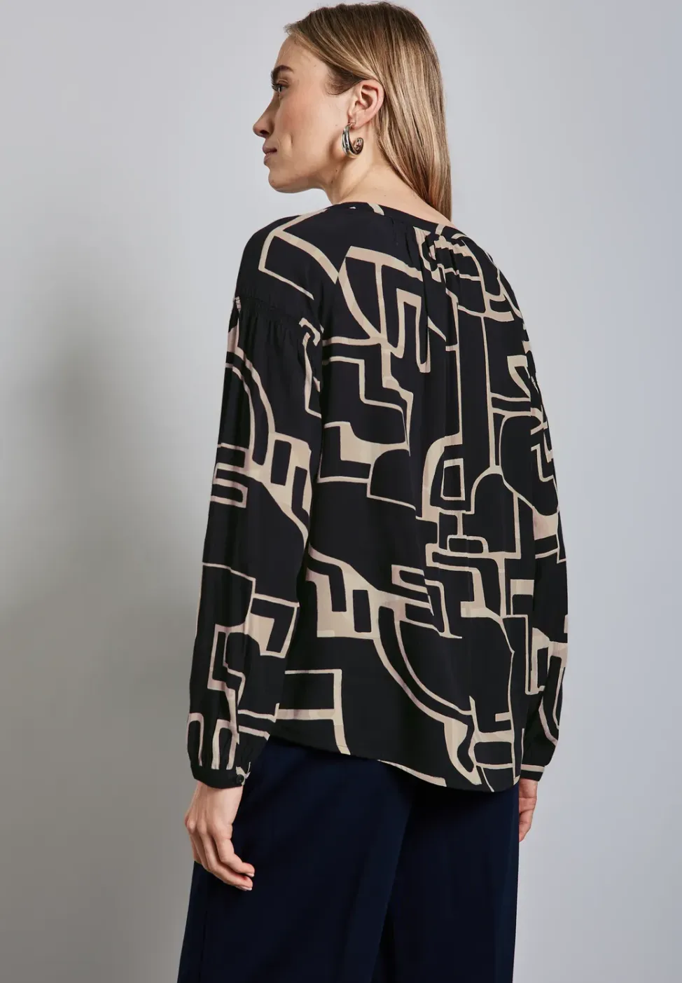 Tuniek met smokdetails