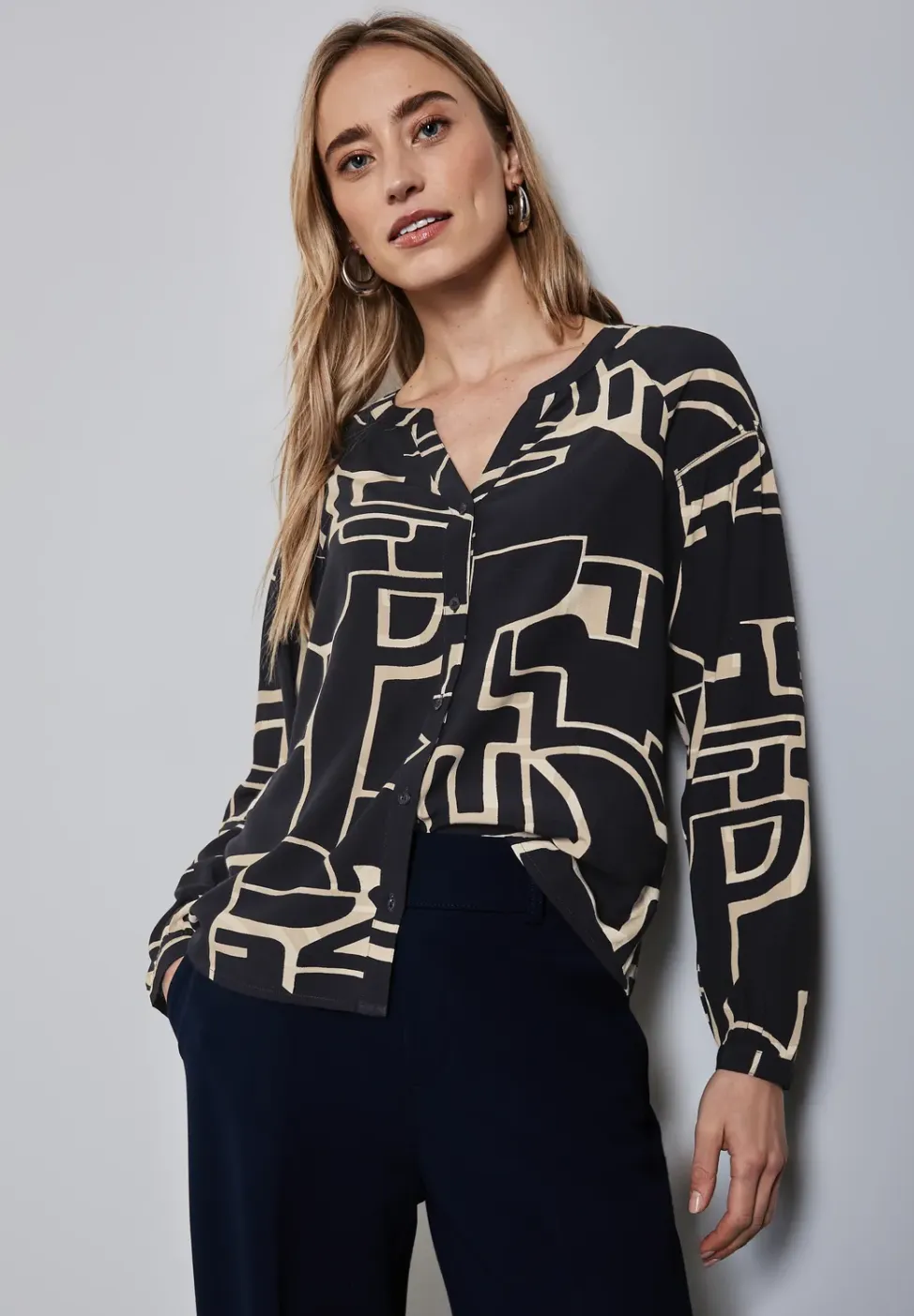 Tuniek met smokdetails