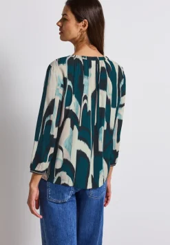 Tuniek met tapedetails