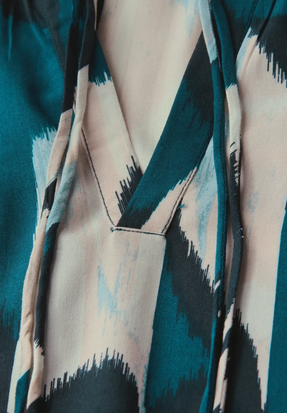 Tuniek met tapedetails