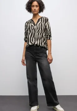 Tuniek met tapedetails