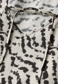 Tuniekjurk met volants
