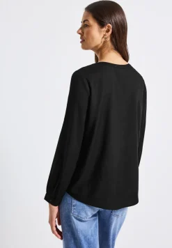 Tuniek met gespleten hals