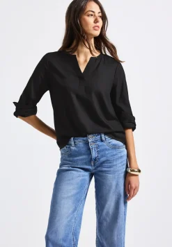 Tuniek met gespleten hals
