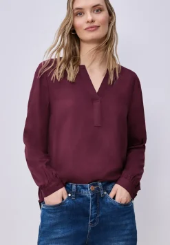 Tuniek met gespleten hals