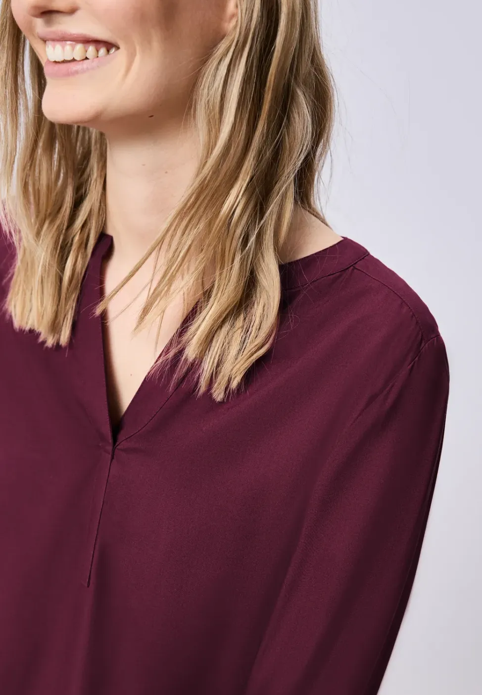 Tuniek met gespleten hals