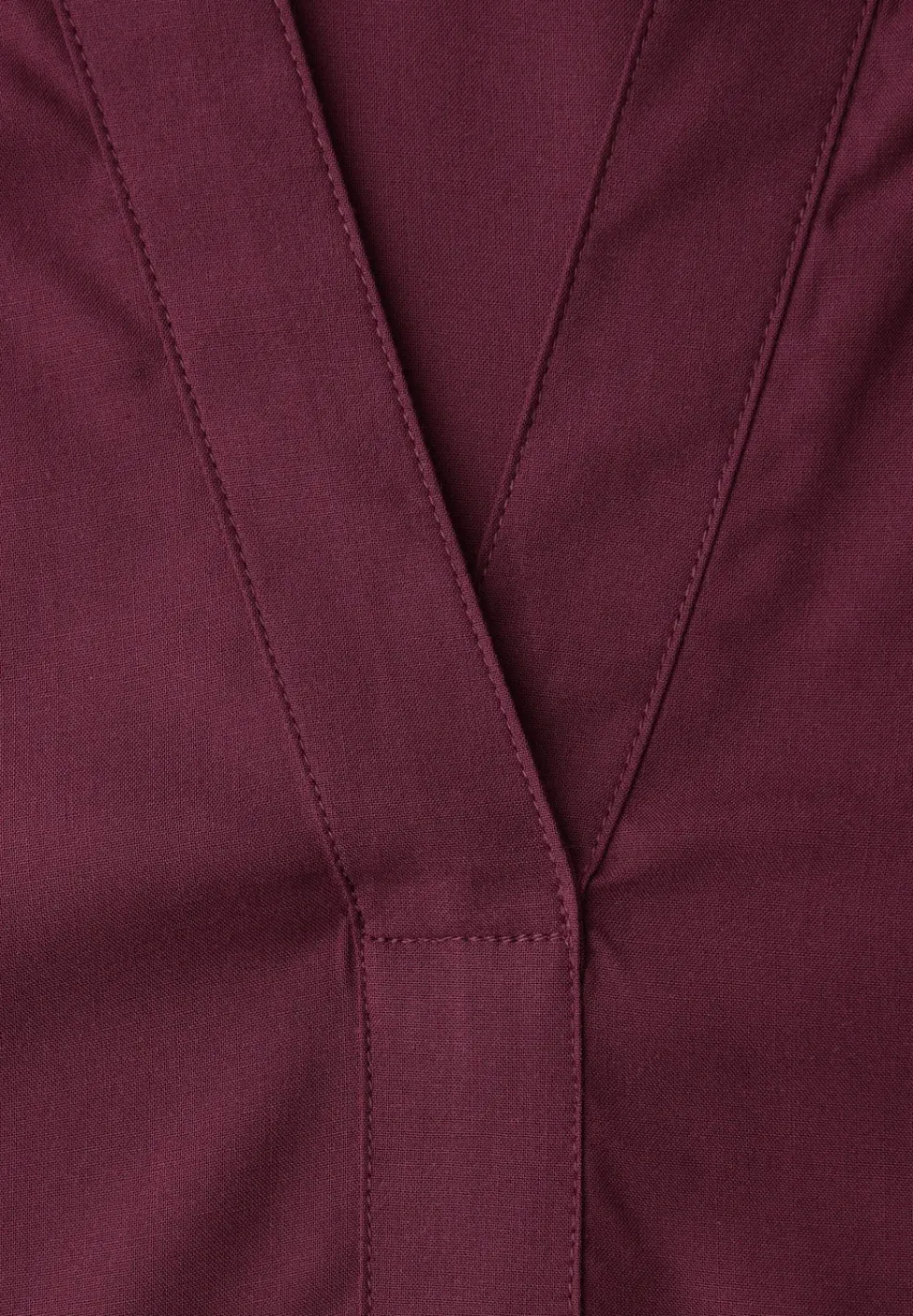 Tuniek met gespleten hals