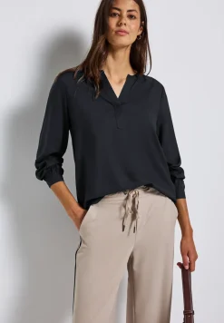 Tuniek met gespleten hals