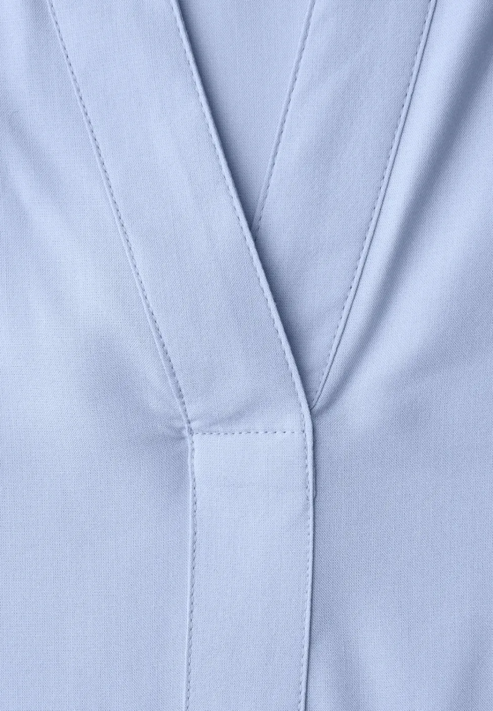 Tuniek met gespleten hals