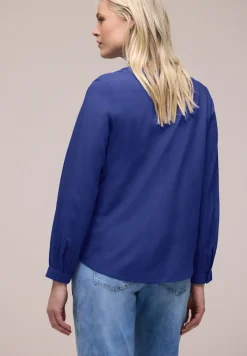 Tuniek met gespleten hals
