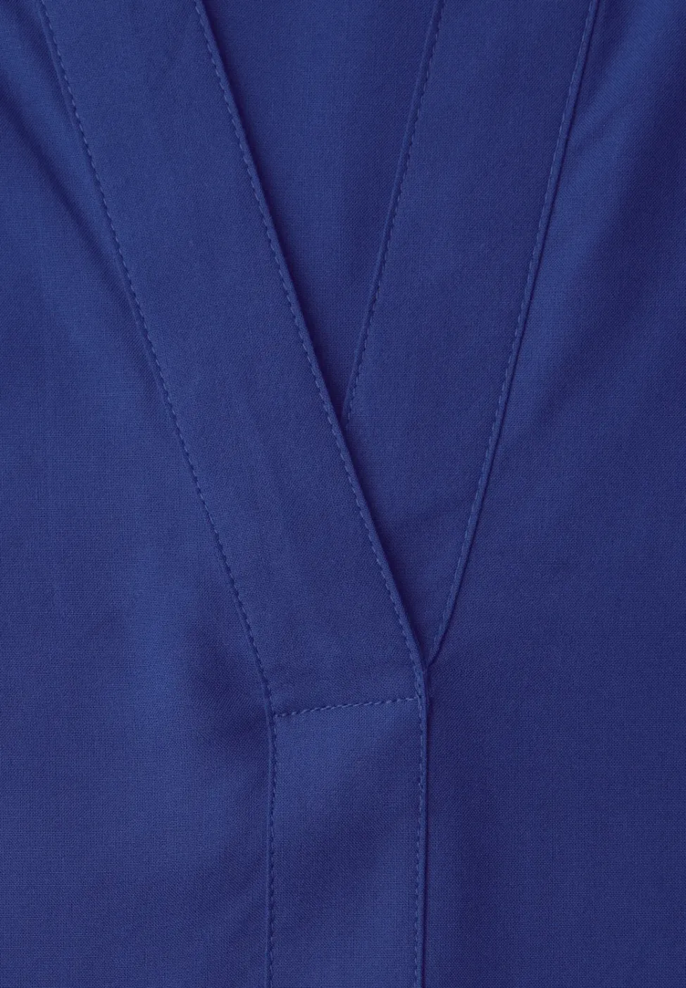 Tuniek met gespleten hals