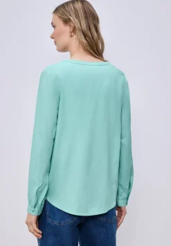 Tuniek met gespleten hals