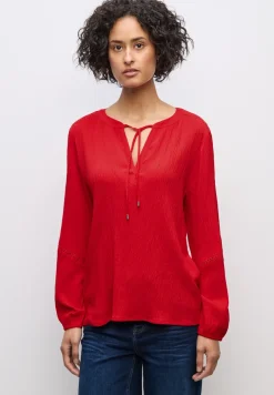 Tuniek met structuur en tape