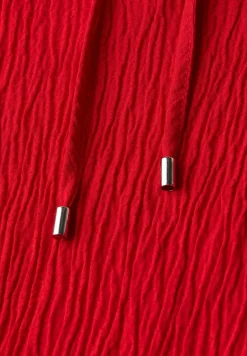 Tuniek met structuur en tape