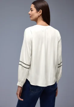Tuniek met tapedetails