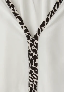 Tuniek met tapedetails