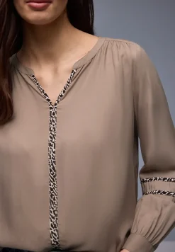 Tuniek met tapedetails