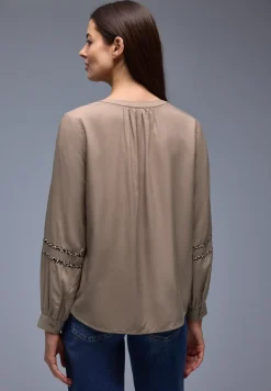 Tuniek met tapedetails