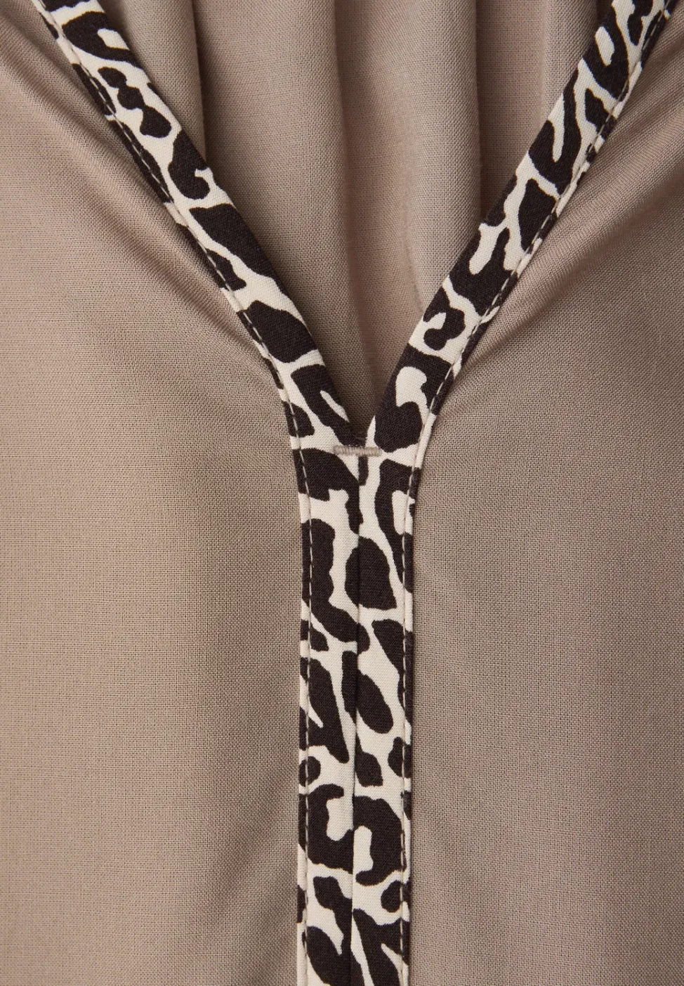 Tuniek met tapedetails