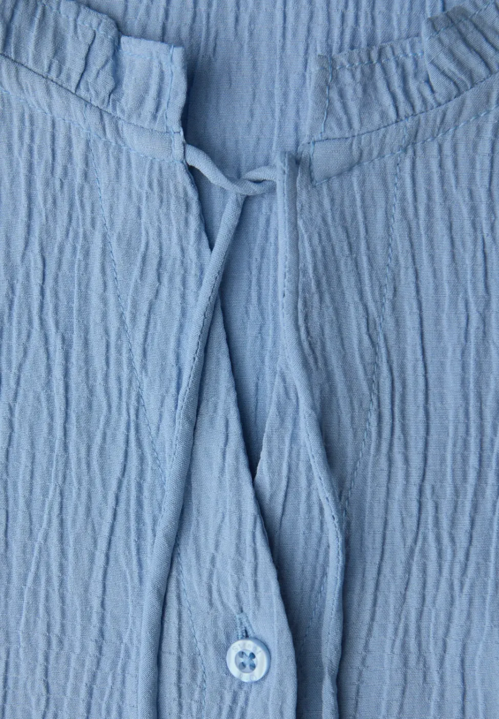 Tuniek met tapingdetails